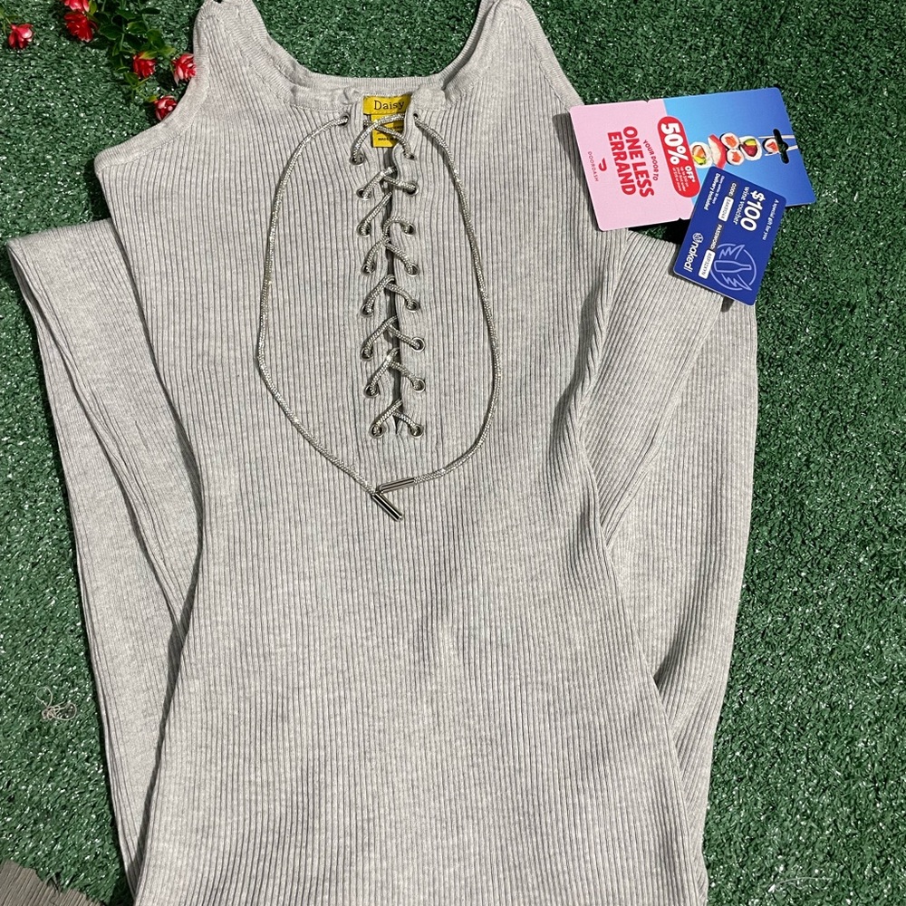 Enterizo gris con plateado largo size L buena tela, estira nuevo